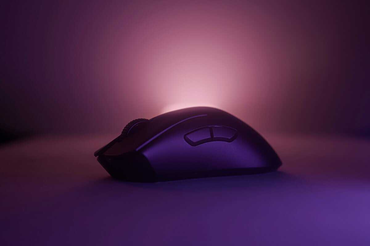 The best gaming mouse under $50 in front of a purple background