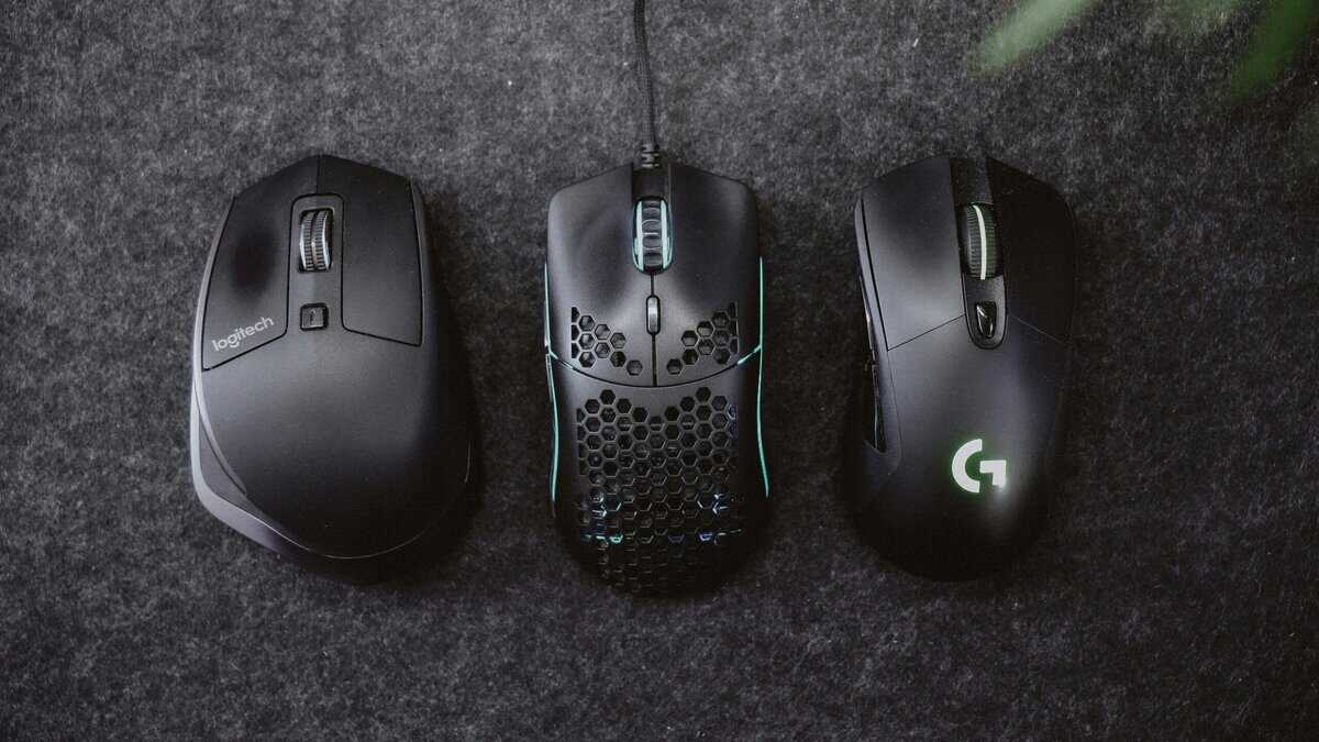 Three potential choices for the best gaming mice under $30 on top of a grey background