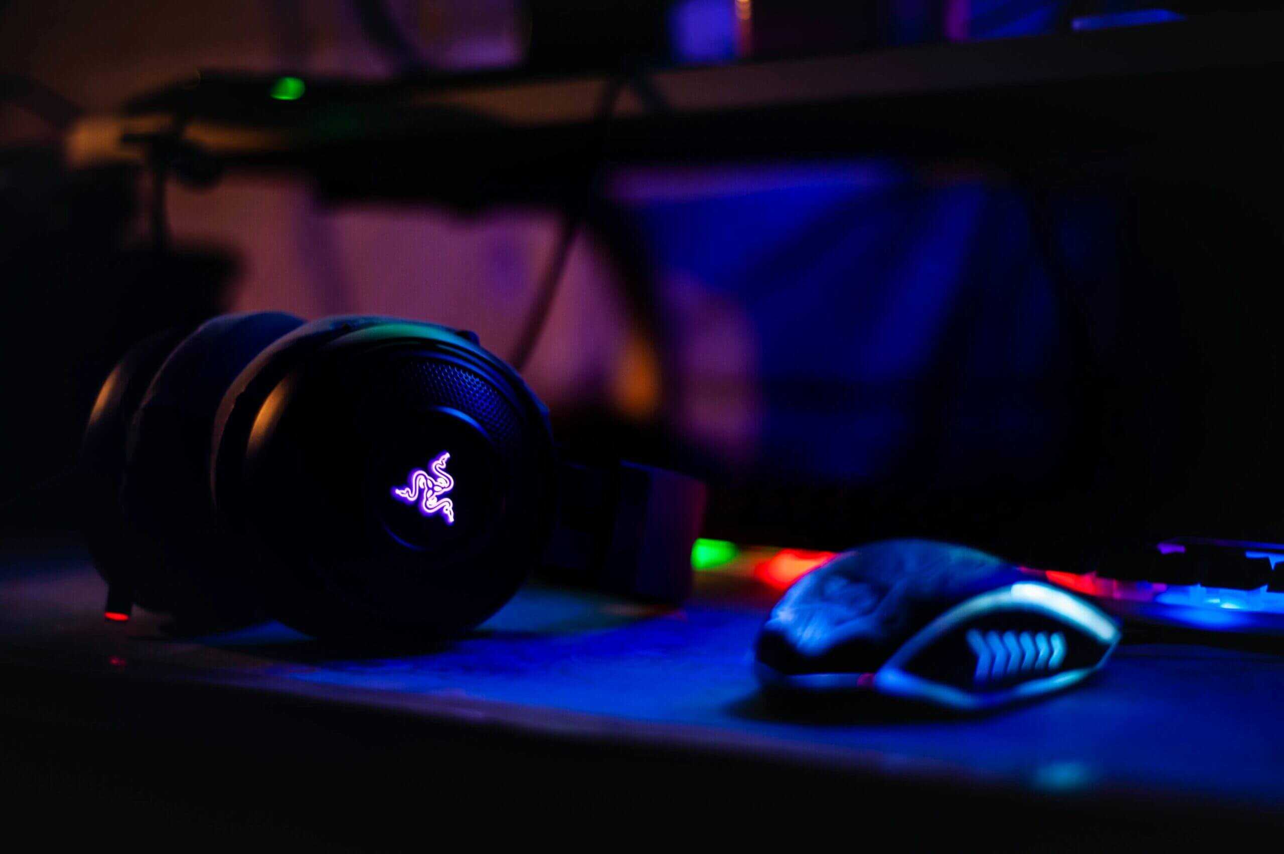 A colorful gaming setup with a mouse and the the best gaming headsets under $50
