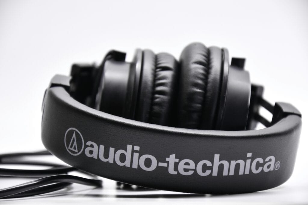 Audio-Technica headphones folded flat showing the branded headband and durable construction, a key feature of the best budget audiophile headphones