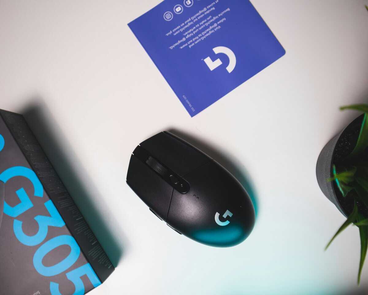 Gamer adjusting mouse settings on a gaming PC, fine-tuning the best budget mouse for CS2 performance