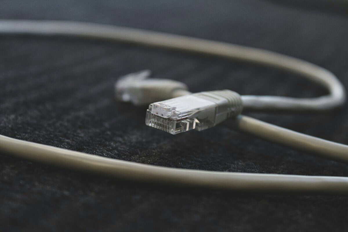 Coiled Ethernet cable with RJ45 connectors, the single best upgrade for how to get better ping