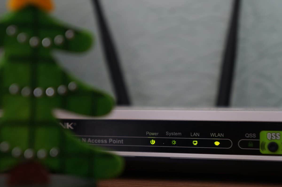 TP-Link router with status LEDs, a typical starting point for anyone learning how to get better ping