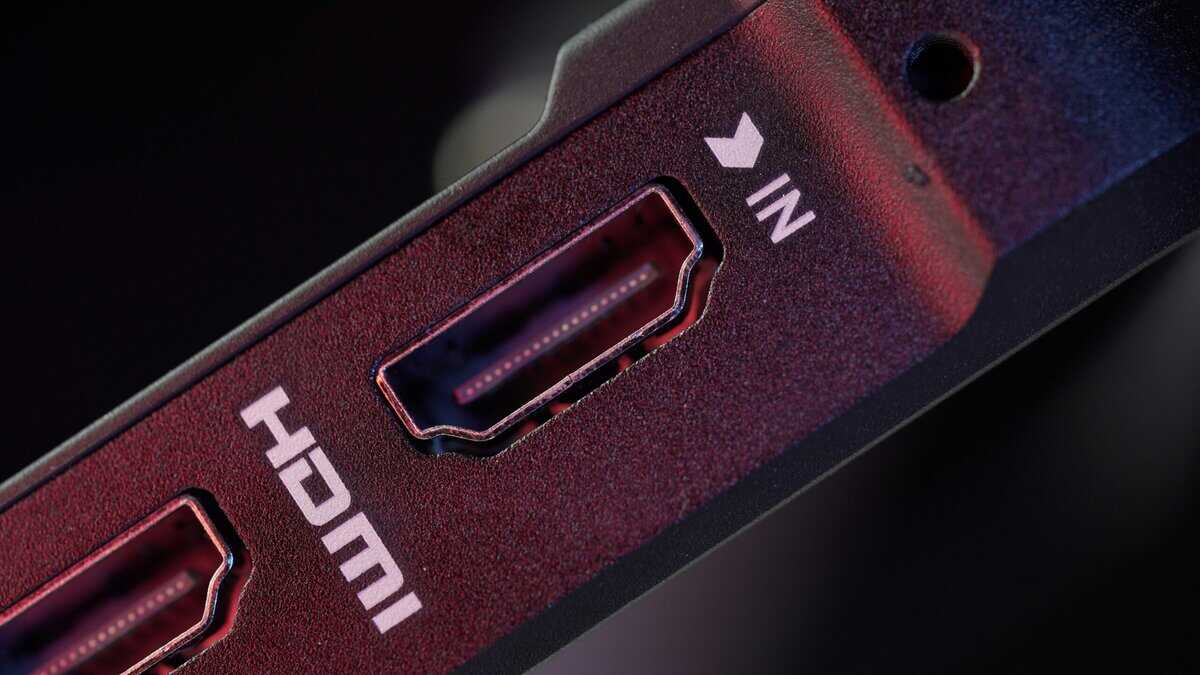 Close-up of HDMI ports labeled HDMI IN on a dark device with red lighting, a key visual in the displayport vs hdmi for gaming comparison
