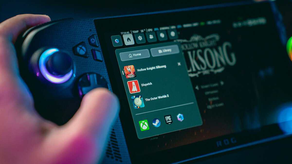 Handheld gaming PC resting on a desk, the kind of portable setup at the heart of Steam Deck vs ROG Ally