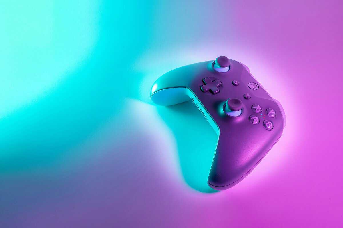 Modern gaming controller on a vibrant gradient backdrop, a baseline option when shopping for the best controller for fighting games