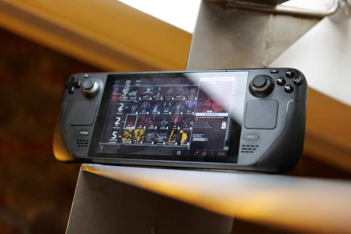 Handheld gaming setup with controllers, the kind of player choosing between Nintendo Switch vs Steam Deck