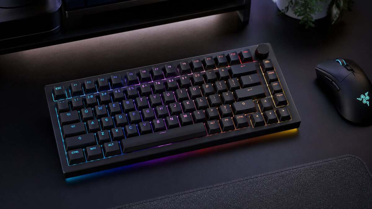 Black RGB 75% mechanical keyboard with a control knob and a gaming mouse, a best 75% keyboard pick for gamers