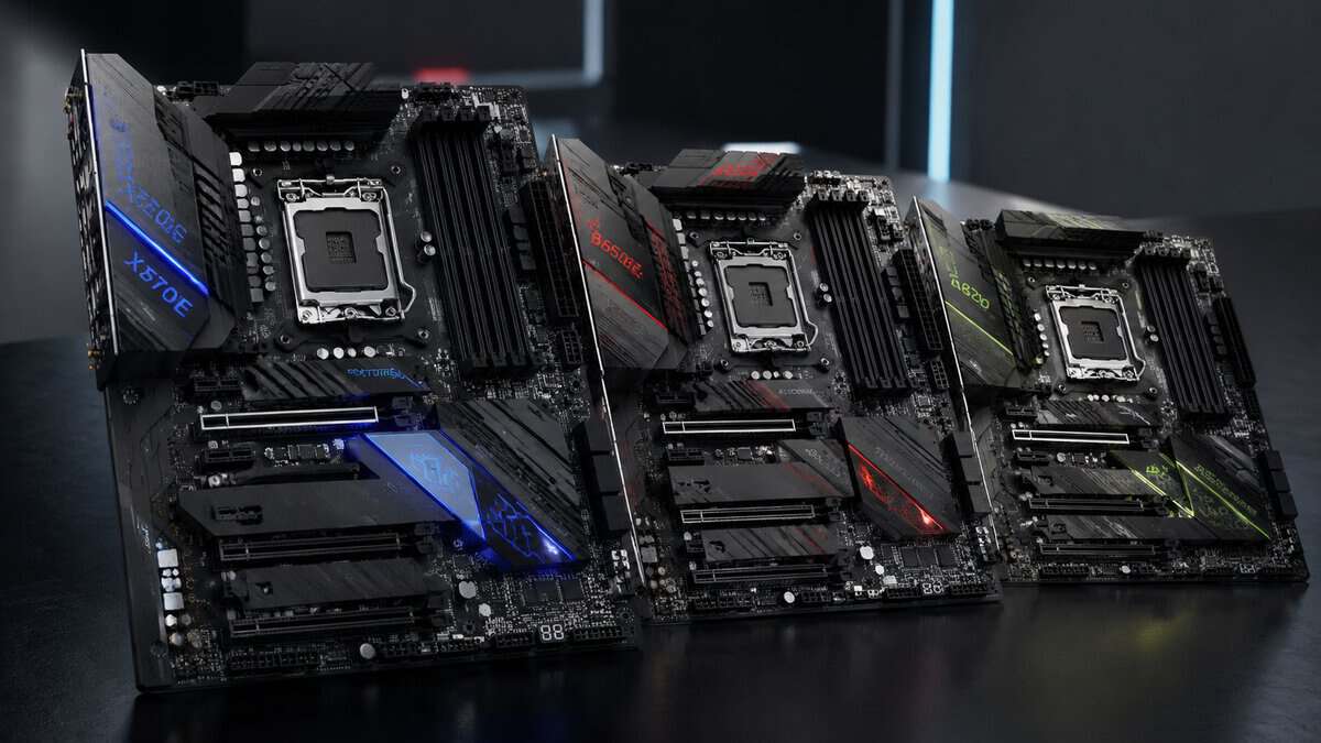 Three gaming motherboards lined up on a dark surface with blue, red, and green accent lighting, the kind of lineup you compare to find the best AM5 motherboard