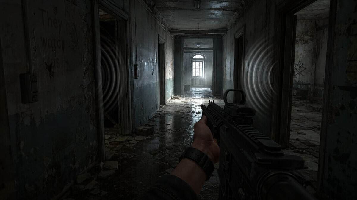 Open-back gaming headphones on a desk, our top choice for the best headset for Tarkov