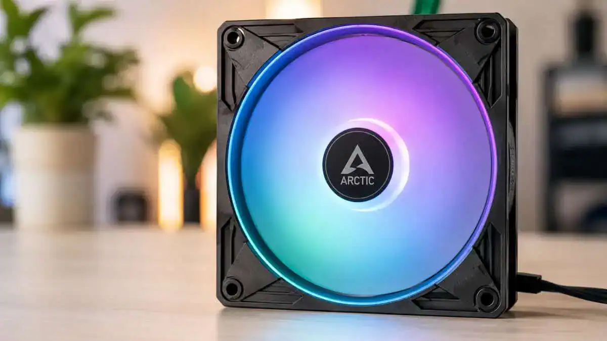 Arctic P12 A-RGB from the best RGB case fans lineup glowing purple and blue on a desk