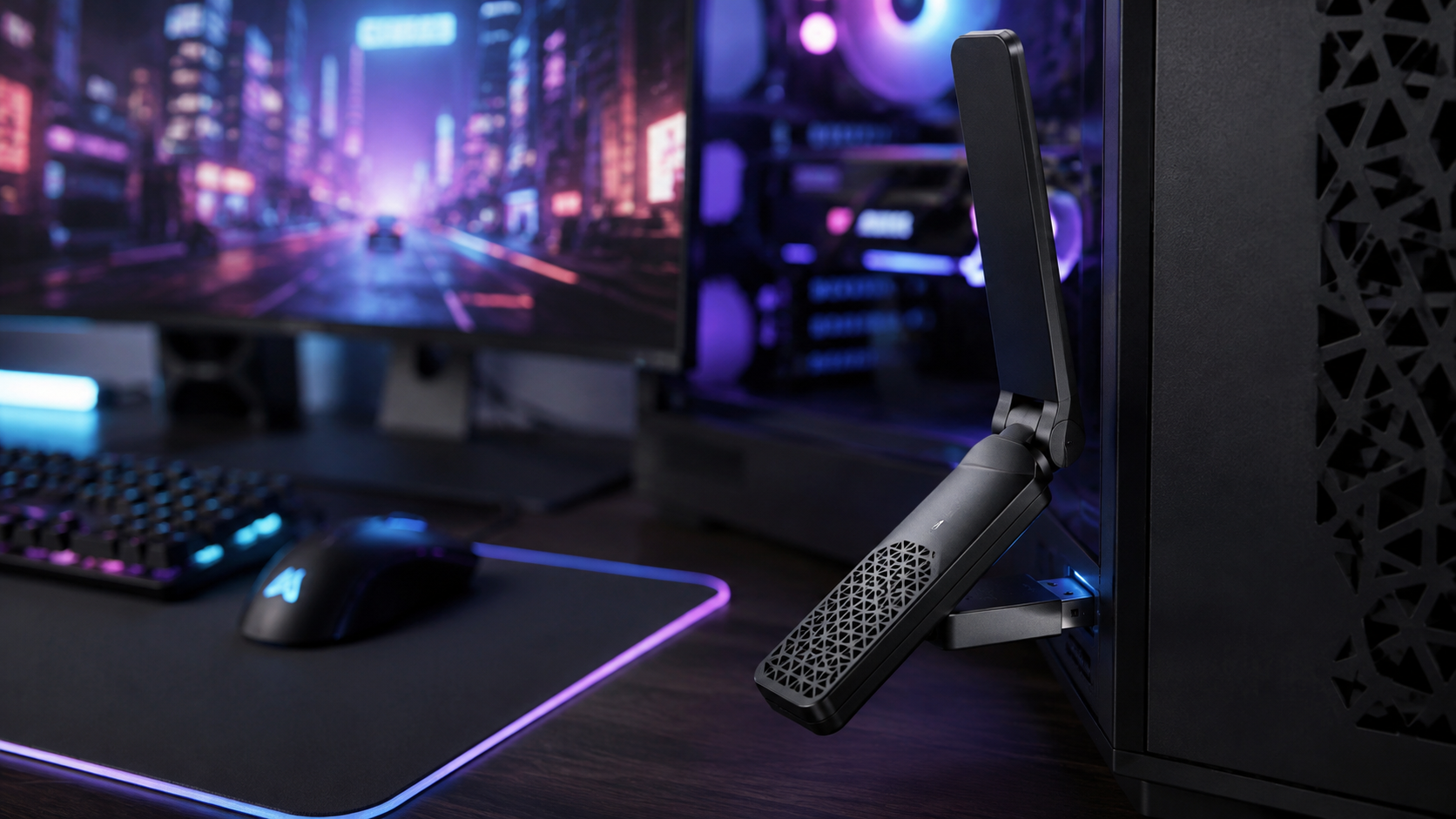 Foldable-antenna USB stick plugged into a gaming tower, the no-tools route to the best WiFi adapter for PC upgrades on an RGB desk