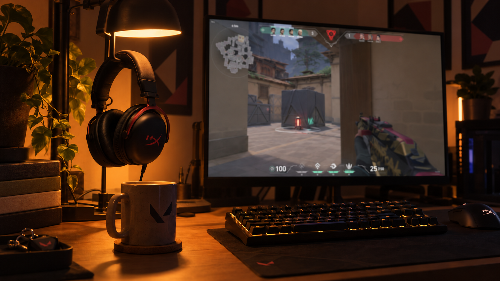 HyperX Cloud III hanging under an amber desk lamp next to a keyboard, a mug, and a monitor paused on a Valorant round, settings time for the best headset for Valorant
