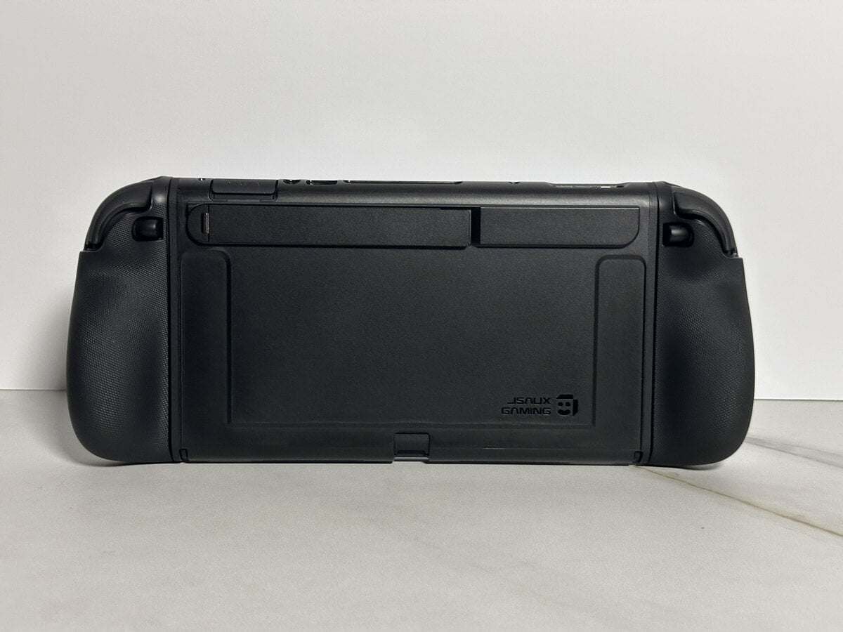 Back of the JSAUX GoJoy case on a Switch 2 with the stand folded in and the Joy-Con covers and grips attached