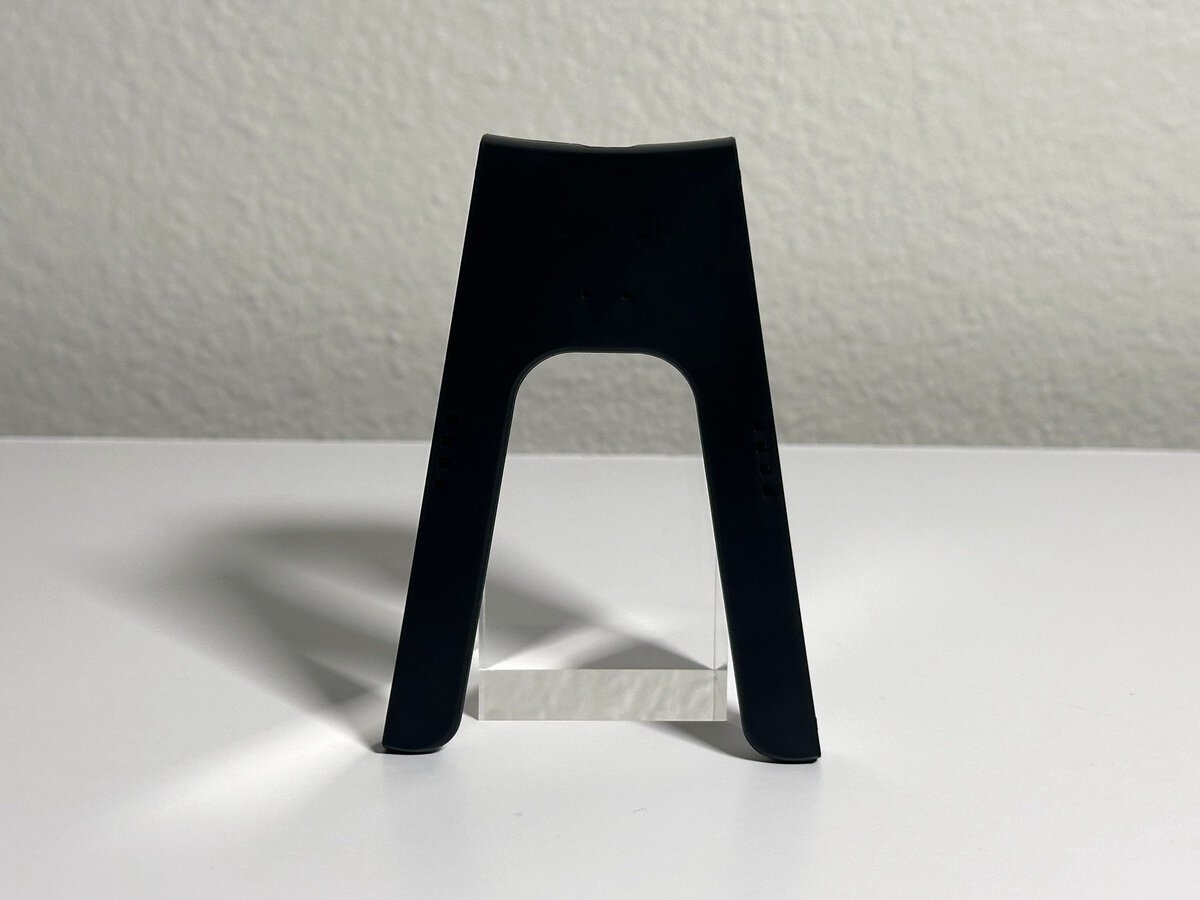 The JSAUX Switch 2 charging grip on its own without Joy-Con attached, showing its slim U shape